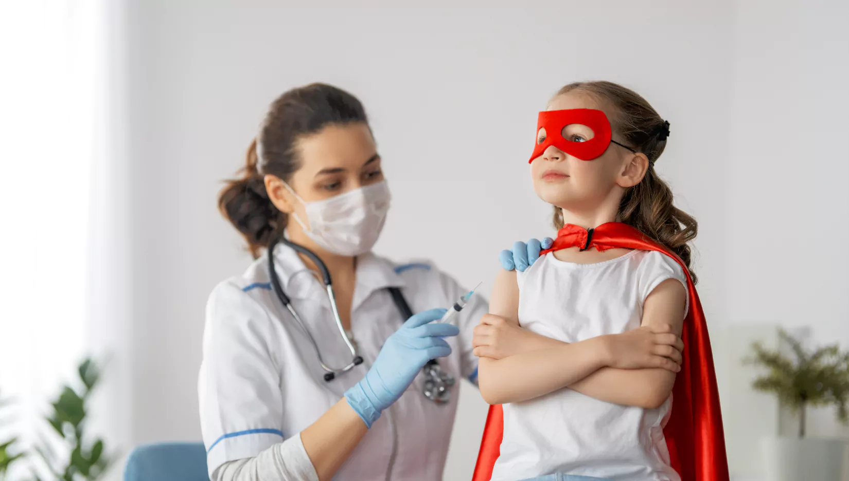 Doctor vaccinating child